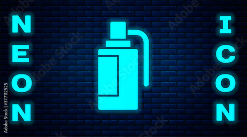 Glowing neon Hand grenade icon isolated on brick wall background. Bomb explosion. Vector.