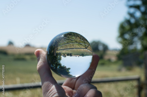 Hixon, Staffordshire seen through a crystal lens ball. photo