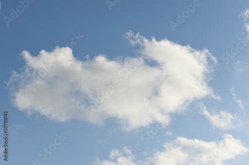 white fluffy clouds in the blue sky