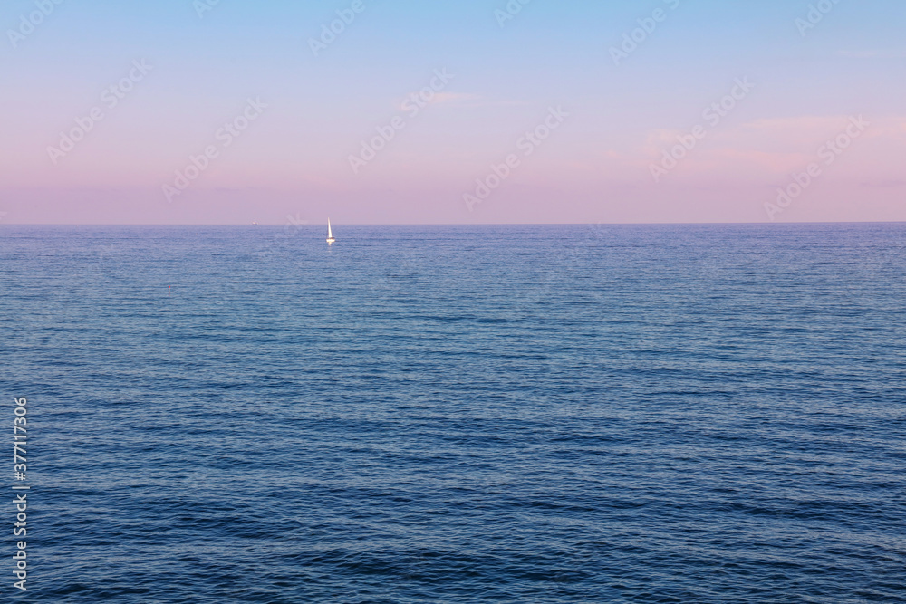 Tranquil sunset seascape with pink sky Tranquil sunset seascape with pink sky