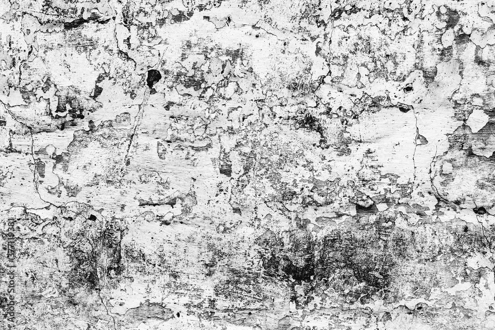 Fototapeta premium Texture of a concrete wall with cracks and scratches