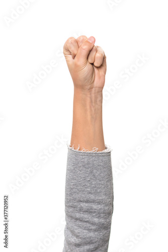 child's hand with fingers in fist