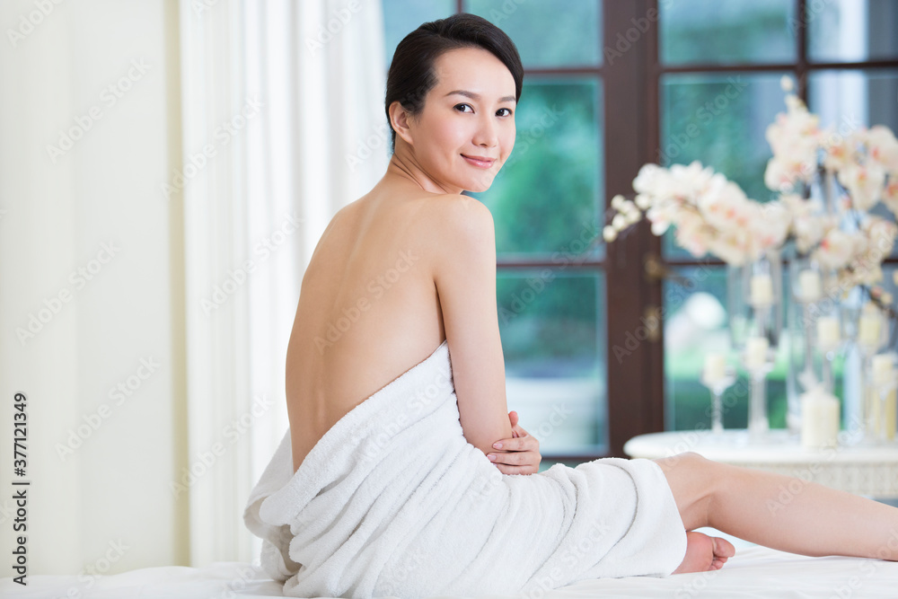 Young woman relaxing on massage table