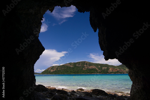 Beautiful tropical koh samaesarn island beach see from cave at Koh Kham Sattahip ,Chonburi ,Thailand photo