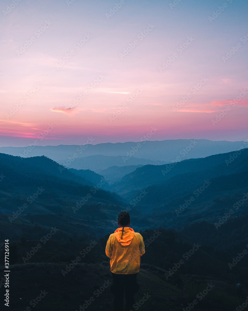 On the hill in the evening, the landscape, the mountain view and the purple and blue in the evening On the hill in the evening, the landscape, the mountain view and the purple and blue in the evening