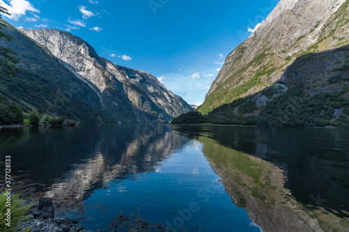Fototapeta Naklejka Na Ścianę i Meble -  Stunning views of the Naeroyfjord, listed as a UNESCO World Heritage Site in the Aurland Municipality in Vestland county, Norway.