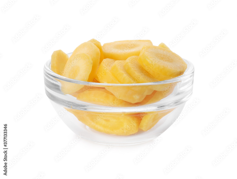 Slices of raw yellow carrot in glass bowl isolated on white Slices of raw yellow carrot in glass bowl isolated on white