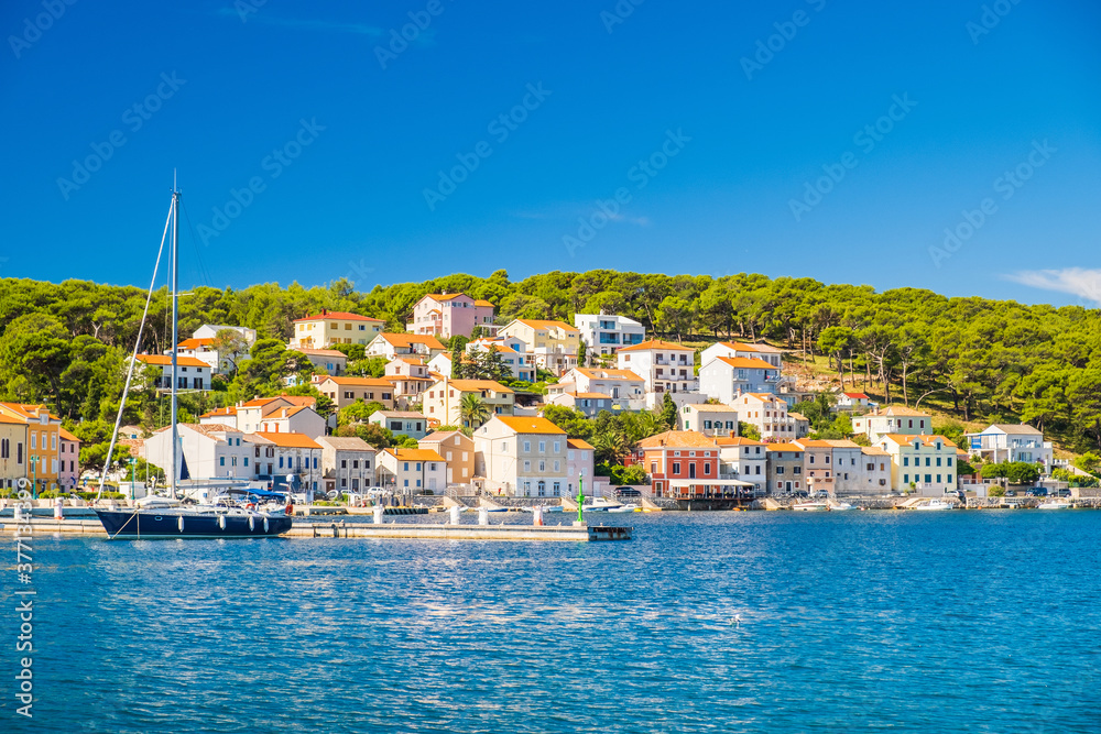 Beautiful town of Mali Losinj on the island of Losinj, Croatia, marina and sail boats on Adriatic coastline
