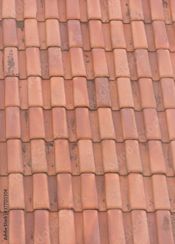 Old roof with dirt tiles. Texture backdrop