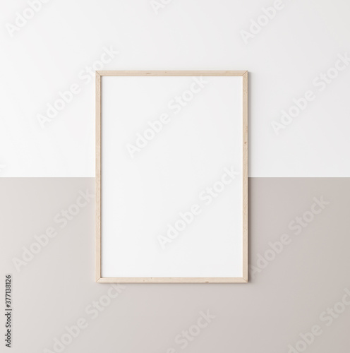 Mockup poster frame, vertical wooden frame on beige and white wall, 3d render