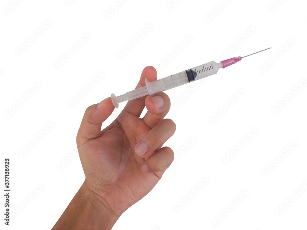 Hand holding Syringe isolated on white background. Hand holding Syringe isolated on white background.