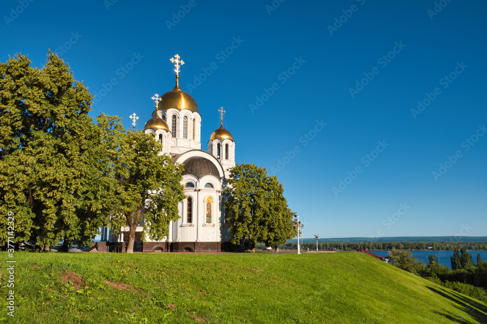 Church of the great Martyr George the victorious in Samara. In the background, the Volga river.
