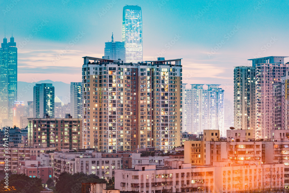 City district view at evening time. Shenzhen. City district view at evening time. Shenzhen.