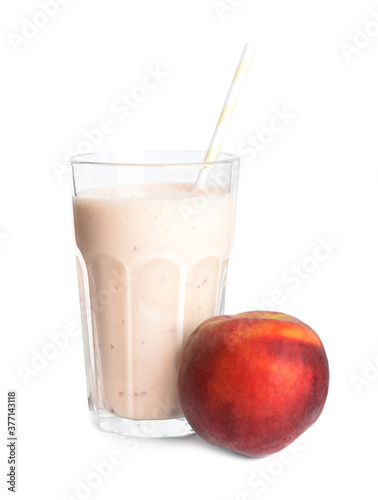 Tasty peach milk shake and fresh fruit isolated on white