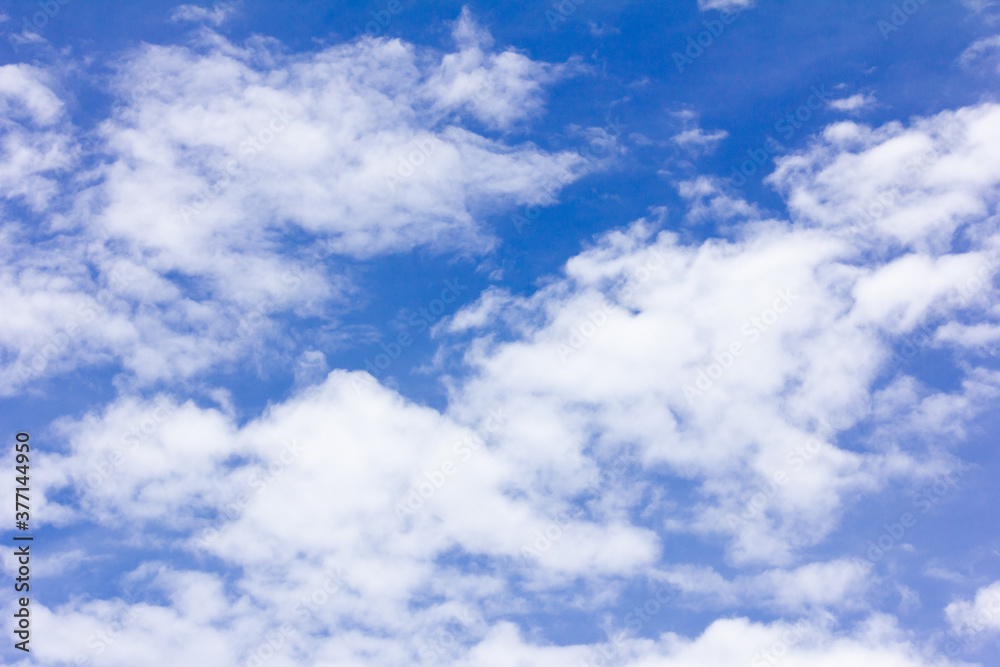 Clear blue color sky with white cloud background Clear blue color sky with white cloud background