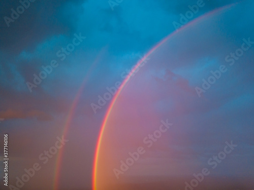 Aerial drone view. Double rainbow on a rainy evening over Kiev city. © Sergey