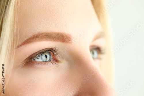 Beautiful female green and gray colored eyes