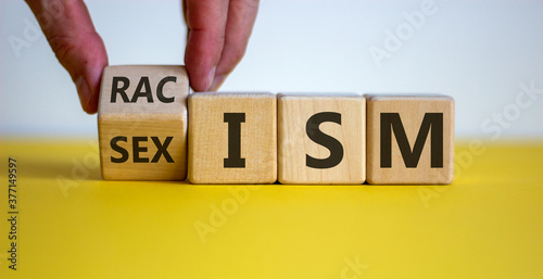 Cube form the words 'racism' and 'sexism'. photo