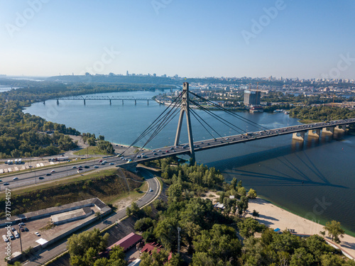 North bridge over the Dnieper river in Kiev. Aerial drone view.