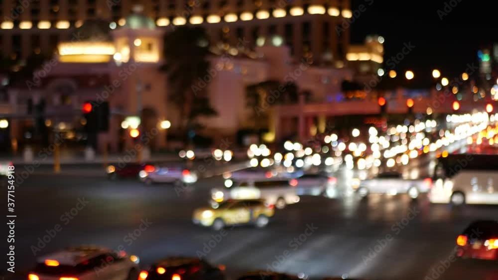 Defocused fabulous Las Vegas Strip boulevard, luxury casino and hotel, gambling area in Nevada, USA. Nightlife and traffic near Fremont street in tourist money playing resort. Neon lights of sin city. Defocused fabulous Las Vegas Strip boulevard, luxury casino and hotel, gambling area in Nevada, USA. Nightlife and traffic near Fremont street in tourist money playing resort. Neon lights of sin city.