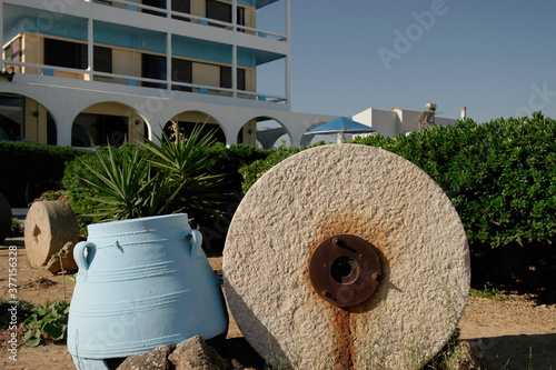 old millstones in the landscape design of the Park photo