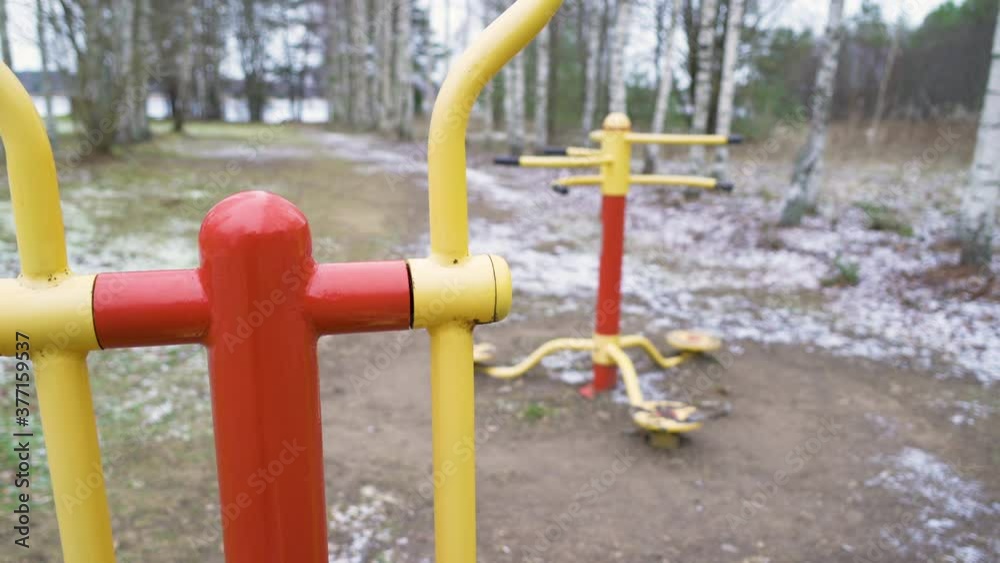 Red and yellow color steel ride in the playground Red and yellow color steel ride in the playground