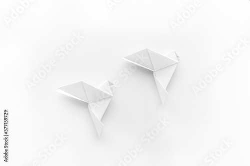 Paper pigeons in origami technique. DIY creativity. View from above