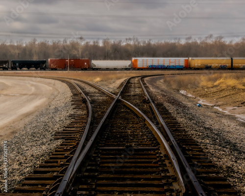 Train cars with graffiti on them.