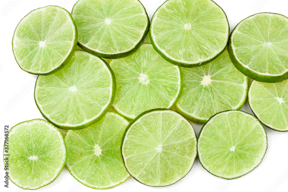 Limes isolated on white background, top view