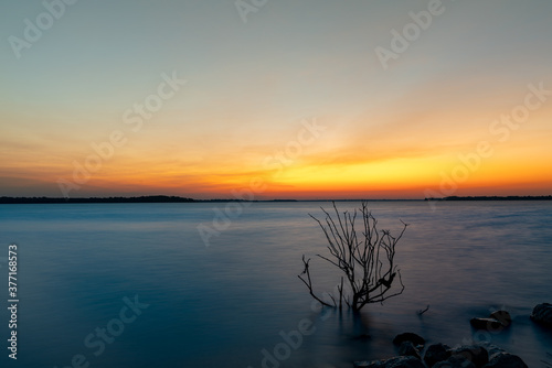 Lake Lavon sunrise during a warm summer morning near Dallas, TX, USA.  photo