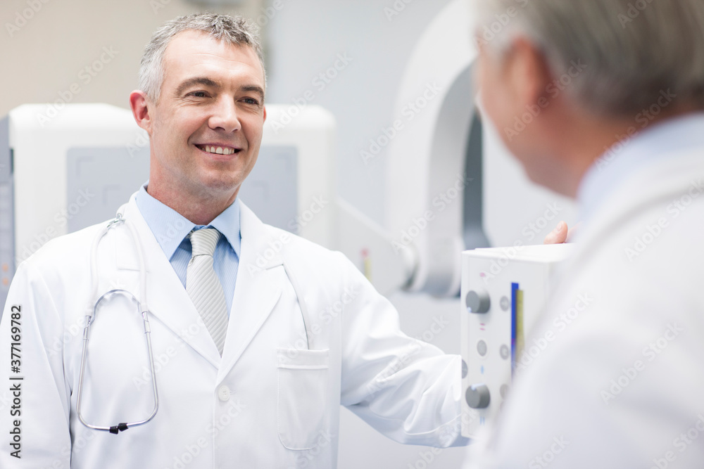 Doctors with MRI scanner Doctors with MRI scanner