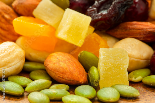 The plate contains nutritious mixed nuts