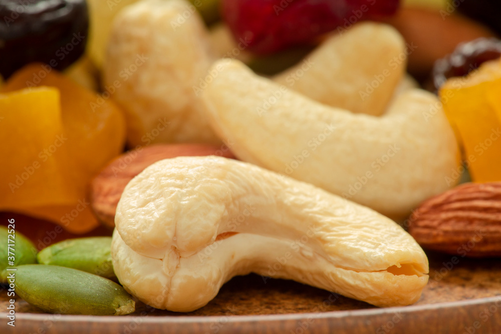 The plate contains nutritious mixed nuts The plate contains nutritious mixed nuts