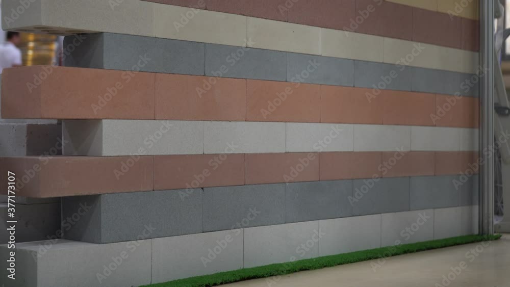 Multi-colored bricks at a construction exhibition
