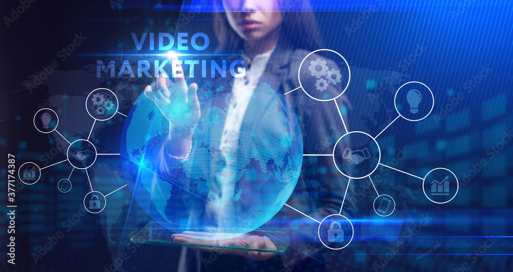 Business, Technology, Internet and network concept. Young businessman working on a virtual screen of the future and sees the inscription: Business, Technology, Internet and network concept. Young businessman working on a virtual screen of the future and sees the inscription: