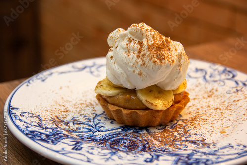 Banoffee Pie. Traditional English dessert prepared with banana and dulce de leche or caramel
