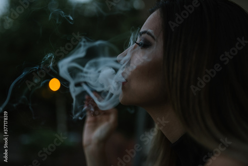 Woman smoking photo