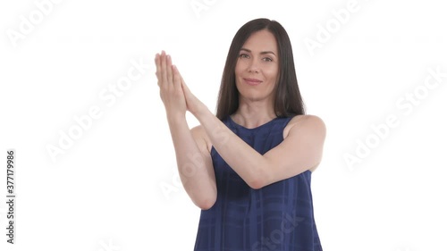 Caucasian woman applauds with displeased face pretending joy for someone else's success. Hypocritical emotions. Isolated on white background