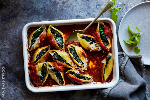 Baked spinach and ricotta stuffed pasta shells photo