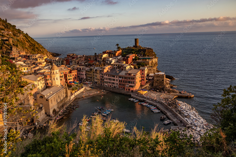 the charming port of Manarola during the sunset