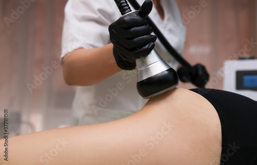 Vacuum massage. Woman getting anti cellulite massage in a beauty SPA salon.