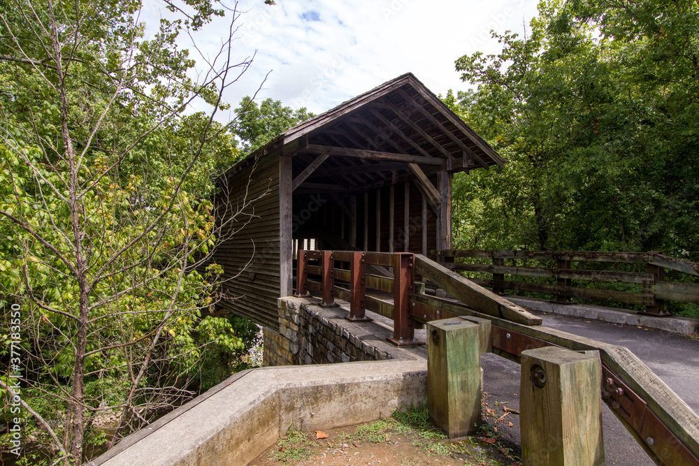 Harrisburg Covered Bridge in Sevier County Tennessee is a popular scenic landmark near the resort towns of Gatlinburg and Pigeon Forge. It is owned by the state of Tennessee and not privately owned. Harrisburg Covered Bridge in Sevier County Tennessee is a popular scenic landmark near the resort towns of Gatlinburg and Pigeon Forge. It is owned by the state of Tennessee and not privately owned.