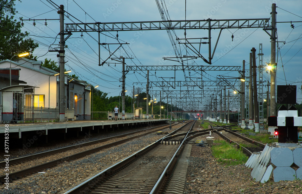 View of railway in evening near Reshetnikovo. Russia