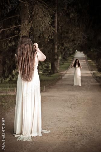the meeting of the twins in the park is like a reflection in a mirror
