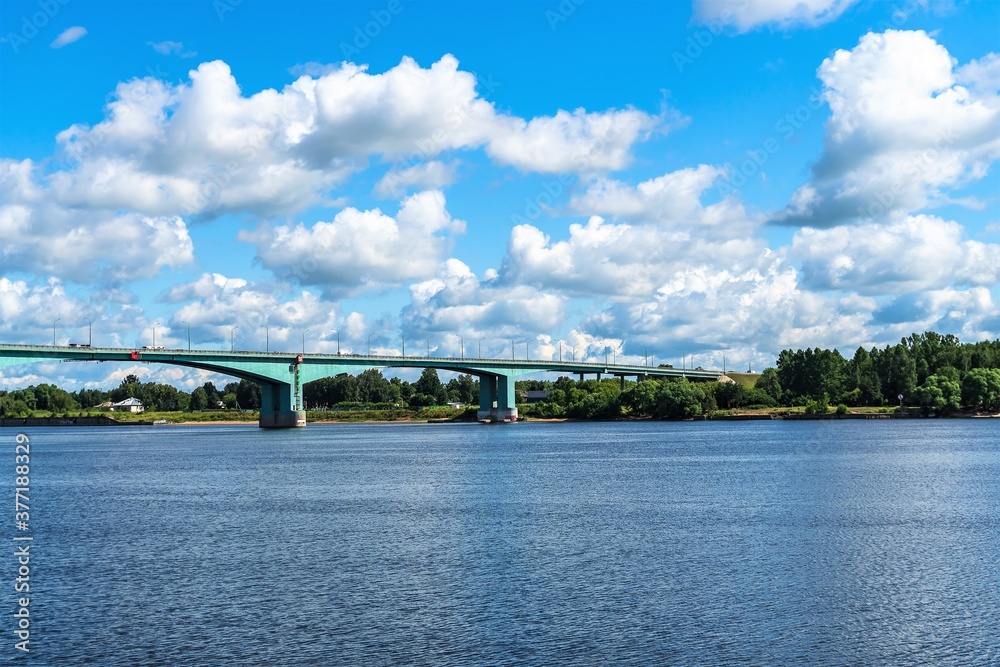 Russia, Yaroslavl, July 2020. View of the large bridge over the Volga river on a sunny day.