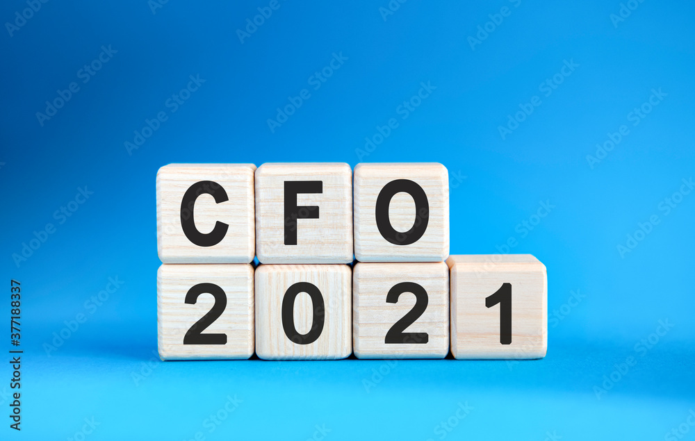 CFO 2021 years on wooden cubes on a blue background CFO 2021 years on wooden cubes on a blue background
