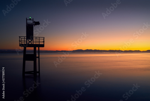 Garry Point Sunset Richmond BC. Georgia Strait and Salish Sea at twilight looking towards Vancouver Island.   © maxdigi