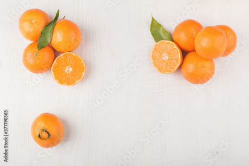 Fresh orange fruits isolated on white background