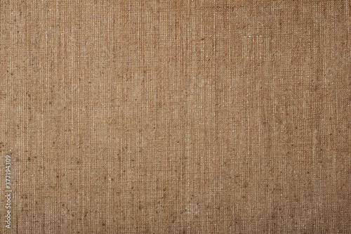  a piece of artistic natural rough brownish canvas.
