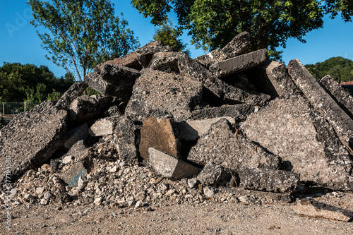 A bunch of building waste on the ground